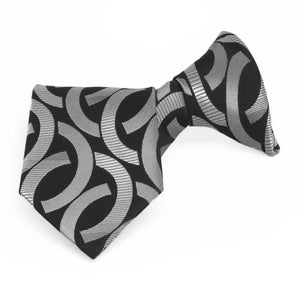 Black and silver link pattern boys' clip-on tie, folded front view
