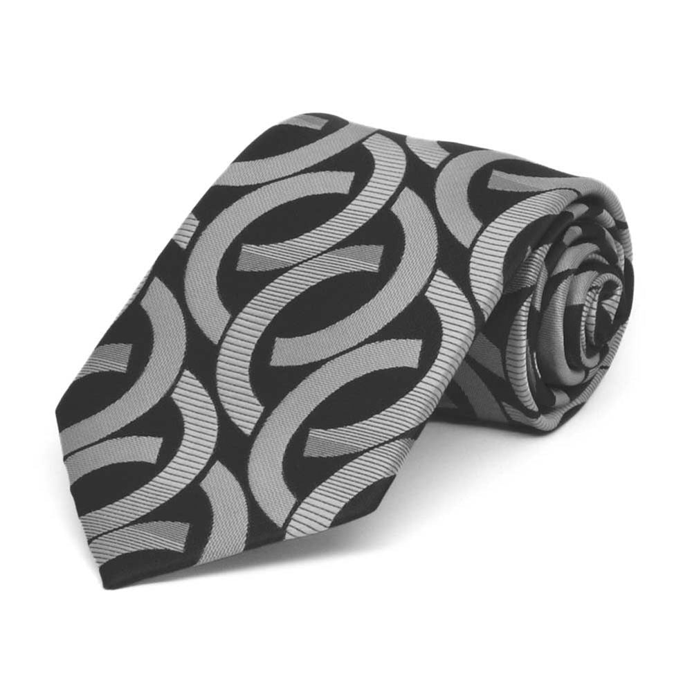 Black and silver link pattern boys' necktie, rolled view to show pattern