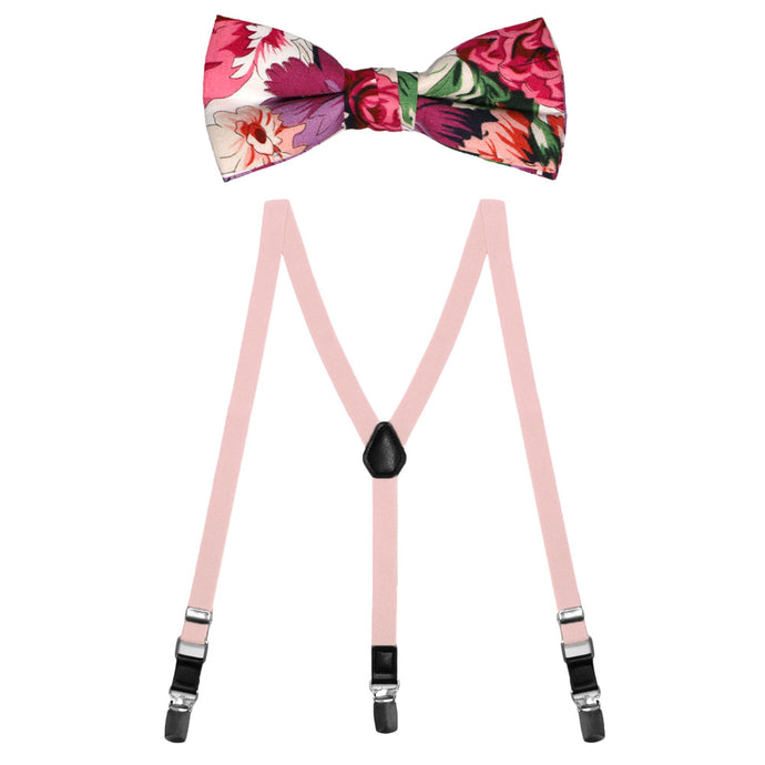 A pink, purple and green floral bow tie paired with a pair of blush pink suspenders