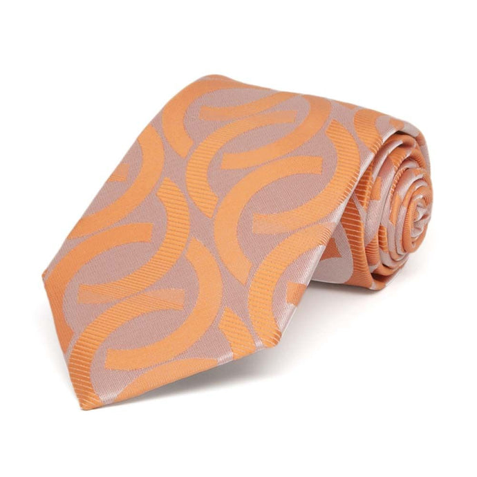 Orange link pattern boys' necktie, rolled to show pattern
