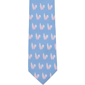 A blue boys' tie with a white bunny ears pattern