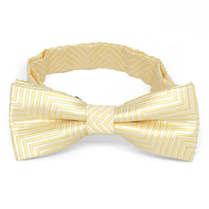 Front view of a light yellow and white chevron pattern boys' bow tie