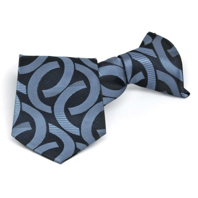 Boys' blue and dark blue link pattern clip-on tie, folded front view