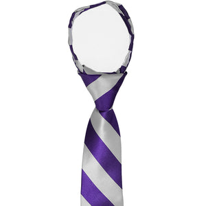 The knot and collar on a boys' pre-tied zipper tie in dark purple and silver