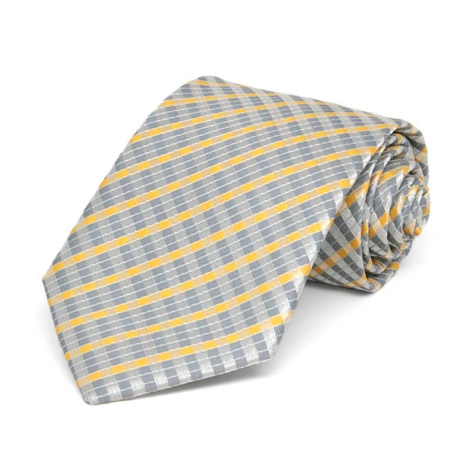 Silver and yellow plaid boys' necktie, rolled to show texture