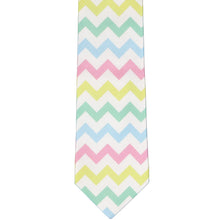 Load image into Gallery viewer, The front of a boys&#39; tie, laid out flat, in white with pastel colored zigzag stripes