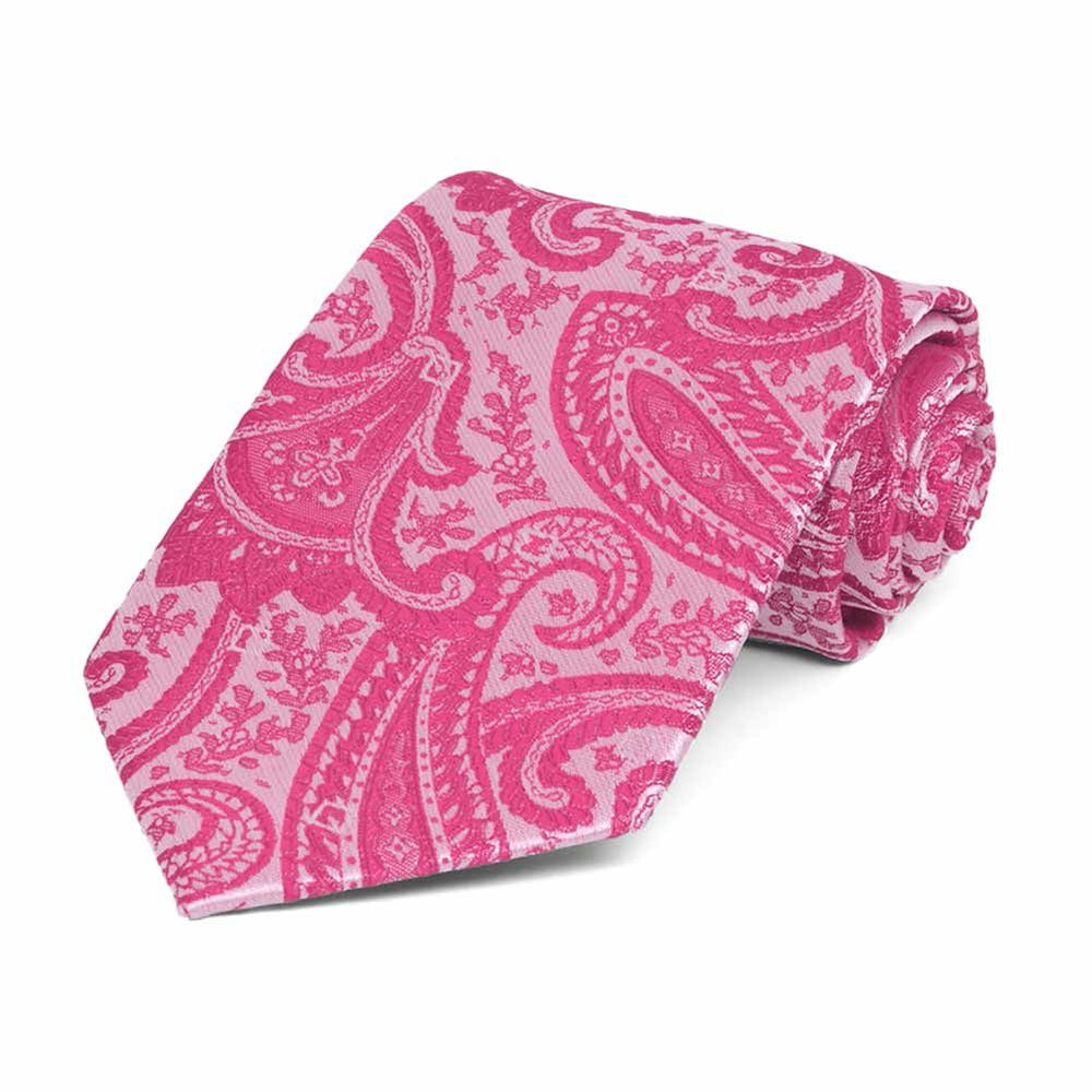 Boys' bright fuchsia paisley necktie, rolled to show pattern up close