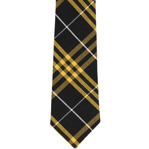 Front tip of a boys' black and gold plaid tie
