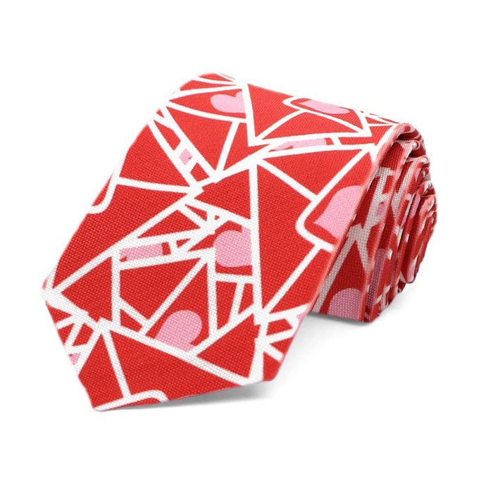A red and pink boys tie in a Valentine's Day envelope pattern