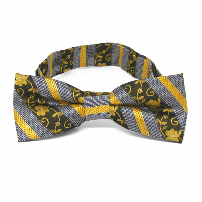 Front view of a black and yellow floral stripe boys' bow tie