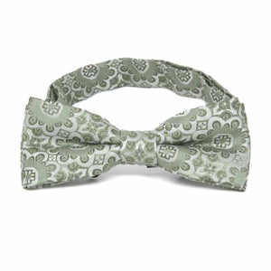 Front view of a boys' floral pattern bow tie in mint green