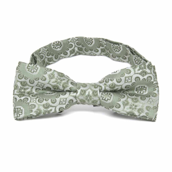 Front view of a boys' floral pattern bow tie in mint green