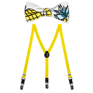 A pineapple kid-size bow tie paired with bright yellow suspenders
