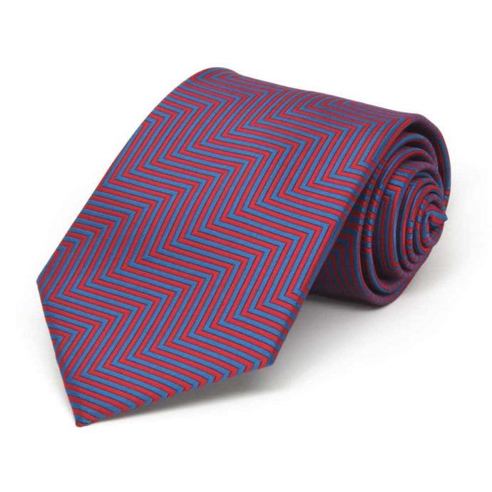 Boys' red and blue chevron striped tie, rolled to show pattern up close