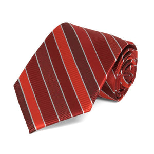 Red and silver striped boys' necktie, rolled to show texture