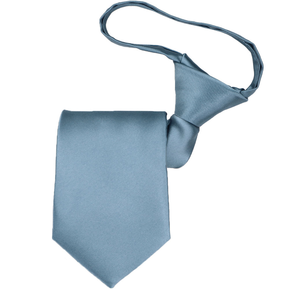A boys' pre-tied serene zipper tie, folded to show off the knot and tie tip