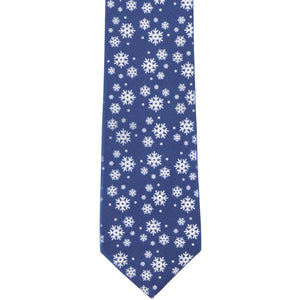 The front of a dark blue tie with scattered snowflakes