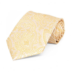Boys' light yellow paisley necktie, rolled to show pattern up close