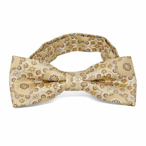 Front view of a tan floral pattern boys' bow tie