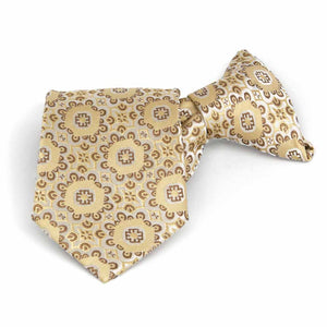 Folded front view of a tan floral pattern boys' clip-on style tie