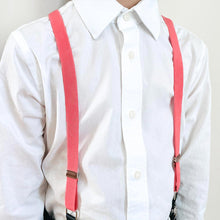 Load image into Gallery viewer, A boy wearing coral suspenders with a white dress shirt