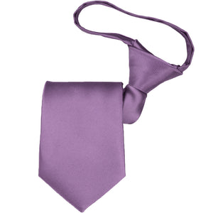 A boys' pre-tied zipper tie, folded to show off the knot and tie tip