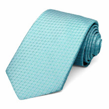 Load image into Gallery viewer, A bright blue lattice patterned necktie, rolled to show the subtle texture