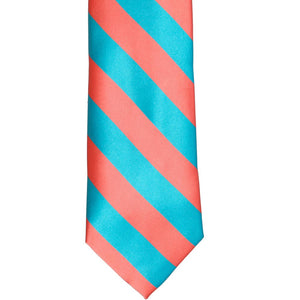 Front of a bright coral and turquoise striped tie, laid out flat