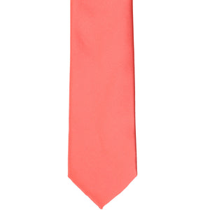 Front bottom view of a bright coral slim tie