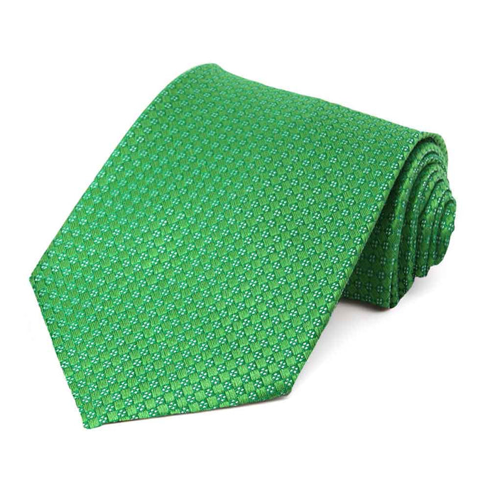 A bright green necktie with a small white checker pattern rolled to show off texture and pattern