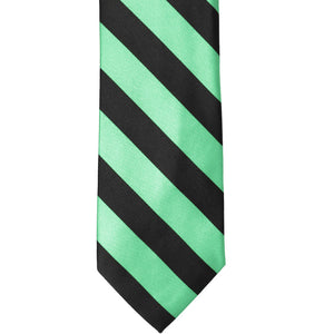 The front of a bright mint and black striped tie, laid out flat