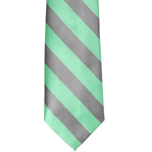 The front of a bright mint and gray striped tie, laid out flat