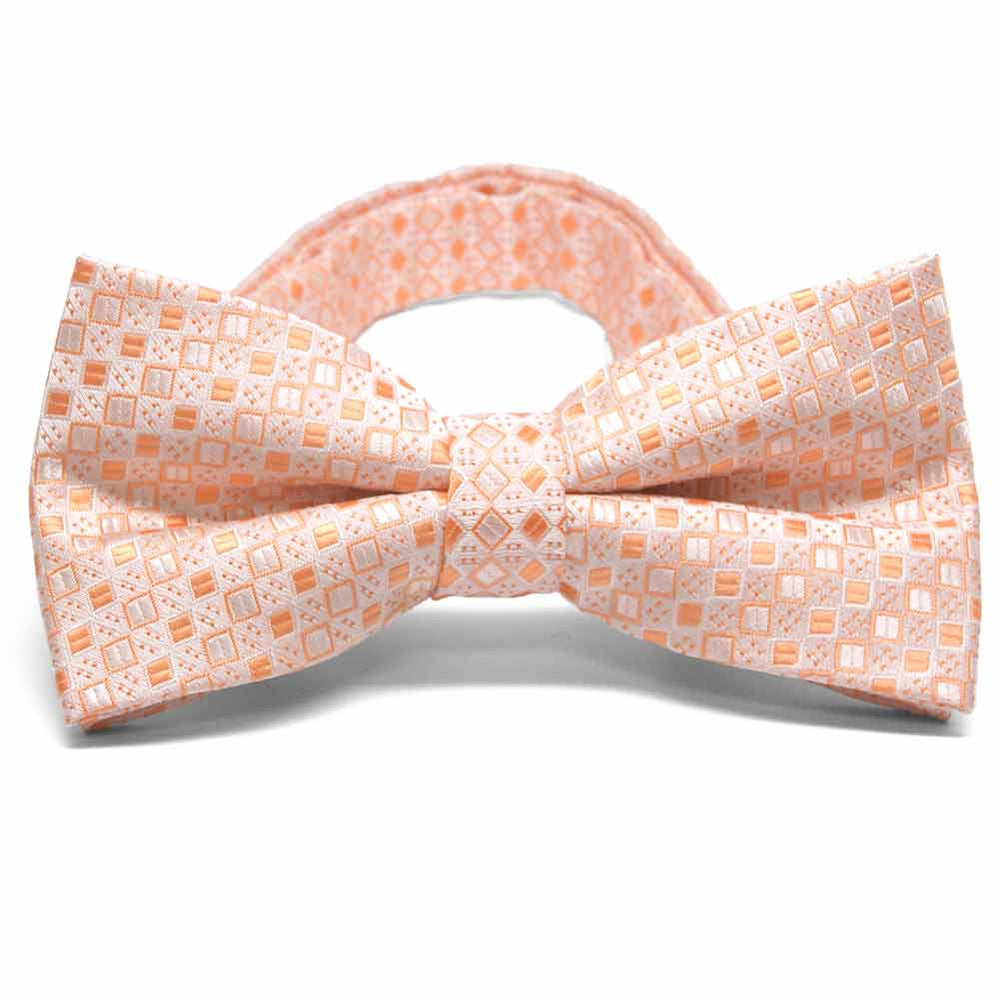 Light orange square pattern bow tie, close up front view