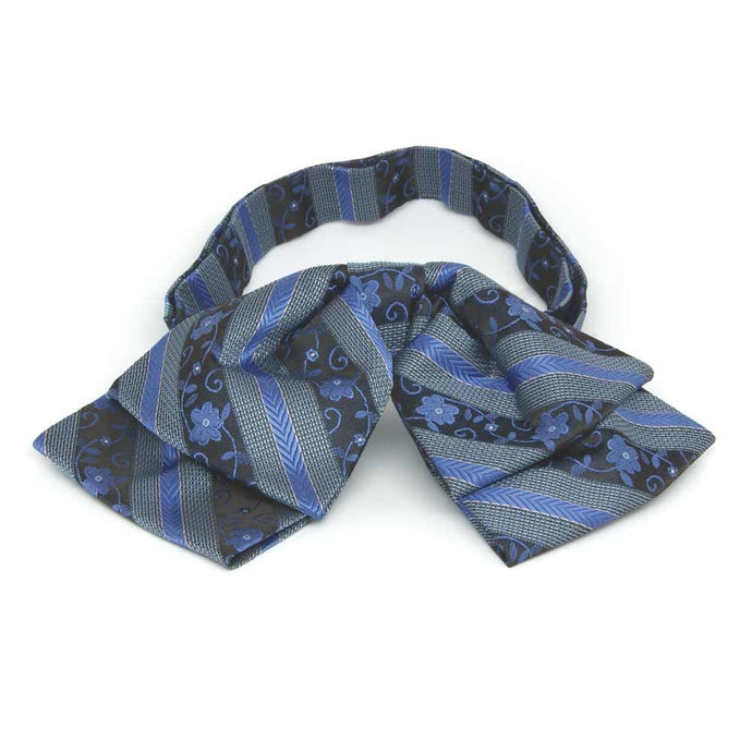 Front view of a blue floral stripe floppy bow tie