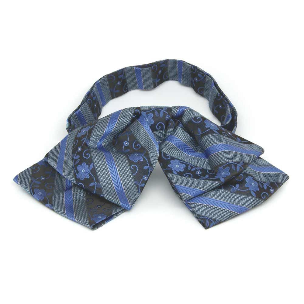 Front view of a blue floral stripe floppy bow tie