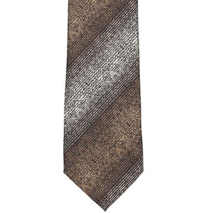 The bottom tip of a brown floral striped tie