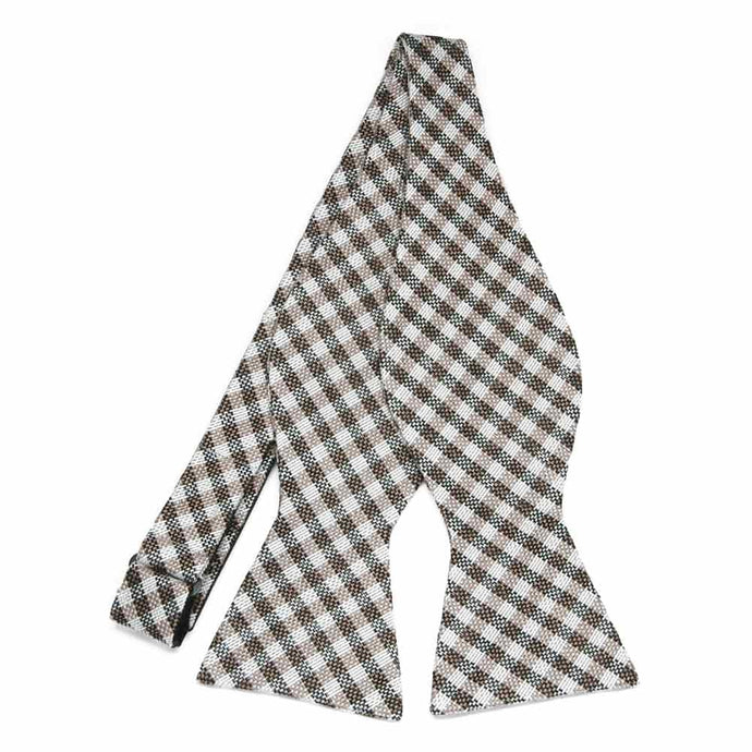 An untied brown white and tan checkered self-tie bow tie