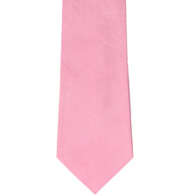 Load image into Gallery viewer, The front of a bubblegum pink herringbone patterned tie, laid out flat