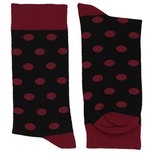 Pair of burgundy and black polka dot socks