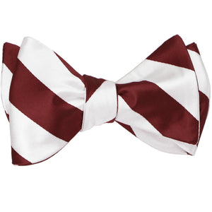 Burgundy and white striped self-tie bow tie, tied
