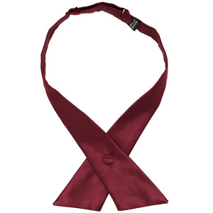A solid burgundy crossover tie with a fabric covered snap