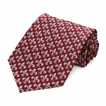 Load image into Gallery viewer, Burgundy and gray fleur-de-lis tie, rolled to show woven texture