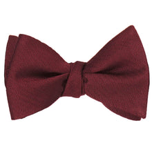 Load image into Gallery viewer, A tied burgundy herringbone self-tie bow tie