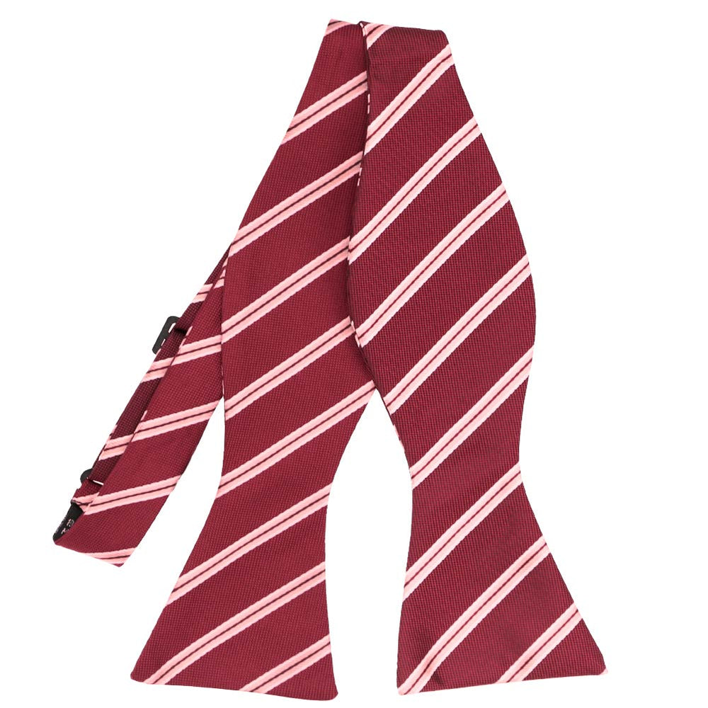 Burgundy and pink striped self-tie bow tie, untied front view