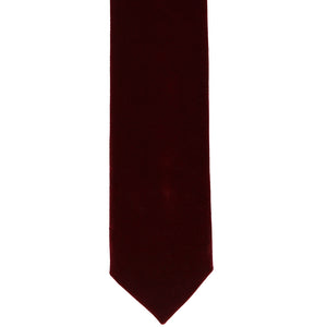 The front view of a velvet tie in burgundy