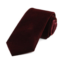 Load image into Gallery viewer, Velvet necktie in burgundy, rolled to show off fabric