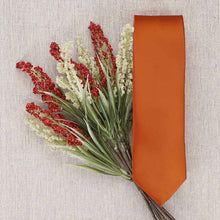 Load image into Gallery viewer, A burnt orange slim tie folded with fall shades of flowers