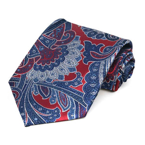Rolled view of a crimson red and blue paisley extra long necktie