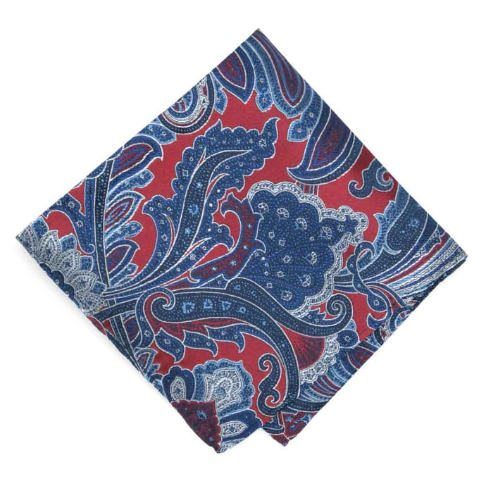 A folded red white and blue paisley pocket square