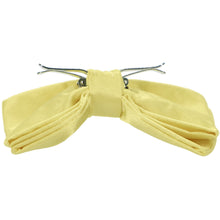 Load image into Gallery viewer, The side view of an opened butter yellow clip-on bow tie